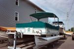 Pontoon Boat Tonneau Cover Featuring a Bimini Top