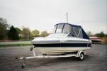 Bimini Top with Three Piece Windshield and Side Windows Complimented with Canvas Aft Cover