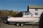 Black Bimini Top with Three Piece Windshield and Side Windows Finished with a Secure Aft Cover